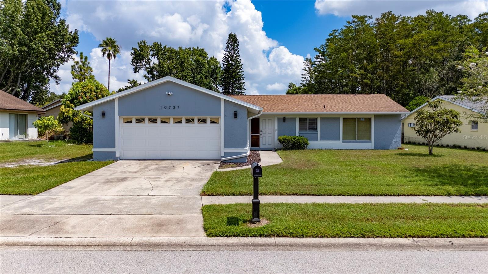 Welcome to 10737 Larissa Street, Orlando, FL 32821
Located in the desirable Williamsburg community, this beautifully updated 3-bedroom, 2-bathroom single-family home offers a perfect blend of modern upgrades, functional design, and an unbeatable location. Just minutes from I-4, SR-528, the Turnpike, and SR-417, the home provides convenient access to Orlando’s premier destinations, including Walt Disney World, Universal Studios, SeaWorld, the Orange County Convention Center, International Drive, and the highly anticipated Epic Universe theme park—just down the street.
The residence features a well-designed split floor plan with two spacious primary suites, ideal for guests or multigenerational living. Inside, the home boasts tile flooring throughout, fresh interior and exterior paint, and a modern ceiling finish that adds a contemporary touch. The recently renovated kitchen is a standout, showcasing quartz countertops, stainless steel appliances, a gas range, wine cooler, and a generous quartz island perfect for cooking and entertaining.
Additional improvements include a new roof installed in 2022, as well as new gutters, fascia, and soffit. The spacious backyard is ideal for outdoor entertaining, with no rear neighbors. For enhanced security and convenience, a Nest video doorbell and exterior camera system are also included. Residents benefit from a low monthly HOA that covers lawn care and access to excellent community amenities, including a pool and spa, clubhouse with billiards and ping pong, and tennis courts.
This is a rare opportunity to own a move-in ready home in a well-established community, offering close proximity to Central Florida’s most exciting attractions, lifestyle amenities, and transportation corridors.