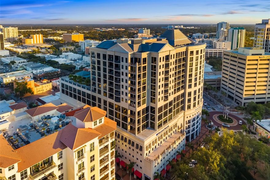 Experience luxury urban living at The Plaza at Five Points, one of downtown Sarasota’s most sought-after high-rises. Perfectly positioned on the 14th floor, Residence 14D offers a refined north-facing vantage point with serene city and multiple water views from the very spacious lanai with soft natural light—ideal for those who appreciate a stunning backdrop while being in the center of it all. Step outside and immerse yourself in Sarasota’s downtown lifestyle. Main Street dining, boutique shopping, cultural venues, theaters, Selby Library, weekend farmers markets, and the sparkling Bayfront are all just steps from your door. Beaches, St. Armands Circle, and the marina are only minutes away. The building itself is structurally sound providing peace of mind and is also connected to Commercial businesses which provides some financial contribution as well and has a resident on the commercial HOA board allowing all voices to be heard.  
Inside the building, residents enjoy a curated collection of resort-style amenities, including a heated pool and spa with cabana, sun deck with grilling area, fully equipped fitness center, residents’ clubroom, boardroom/library, and a guest suite for visitors. Additional conveniences include concierge (7am-11pm) valet services, secure access, and garage parking—offering true lock-and-leave convenience.
Residence 14D blends the ease of luxury condominium living with the vibrancy of downtown Sarasota, making it an exceptional opportunity within this coveted address.
