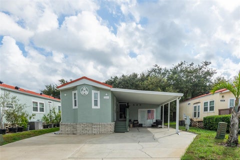 Photo of 6544 La Mesa Road, Land O Lakes, FL 34637 (MLS # TB8556822)
