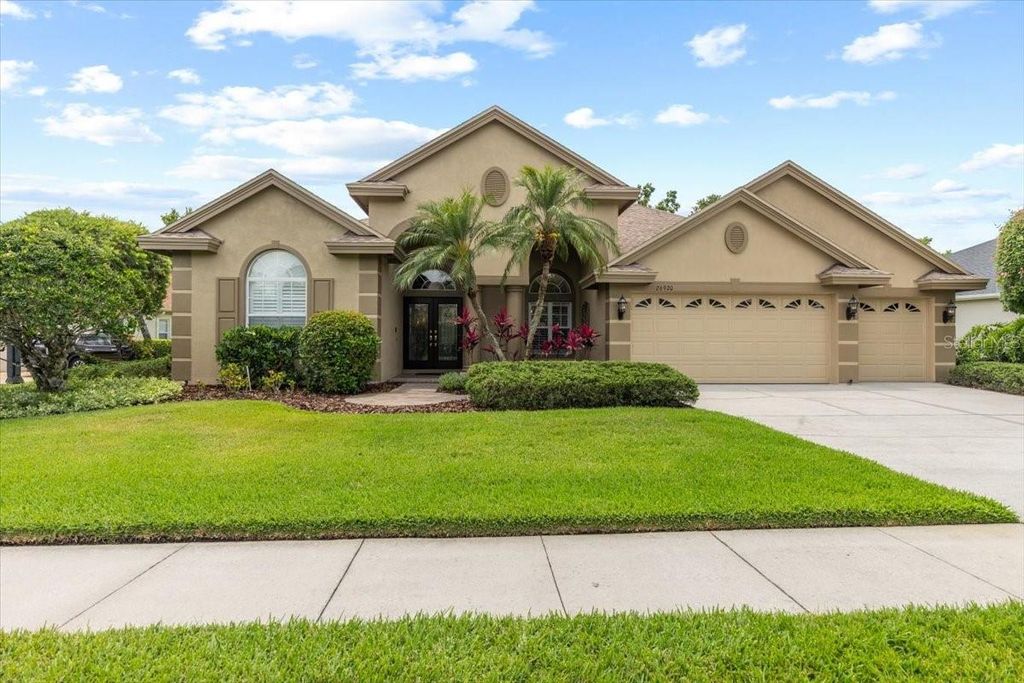 Photo of 26920 Winged Elm Drive, Wesley Chapel, FL 33544 (MLS # TB8365953)
