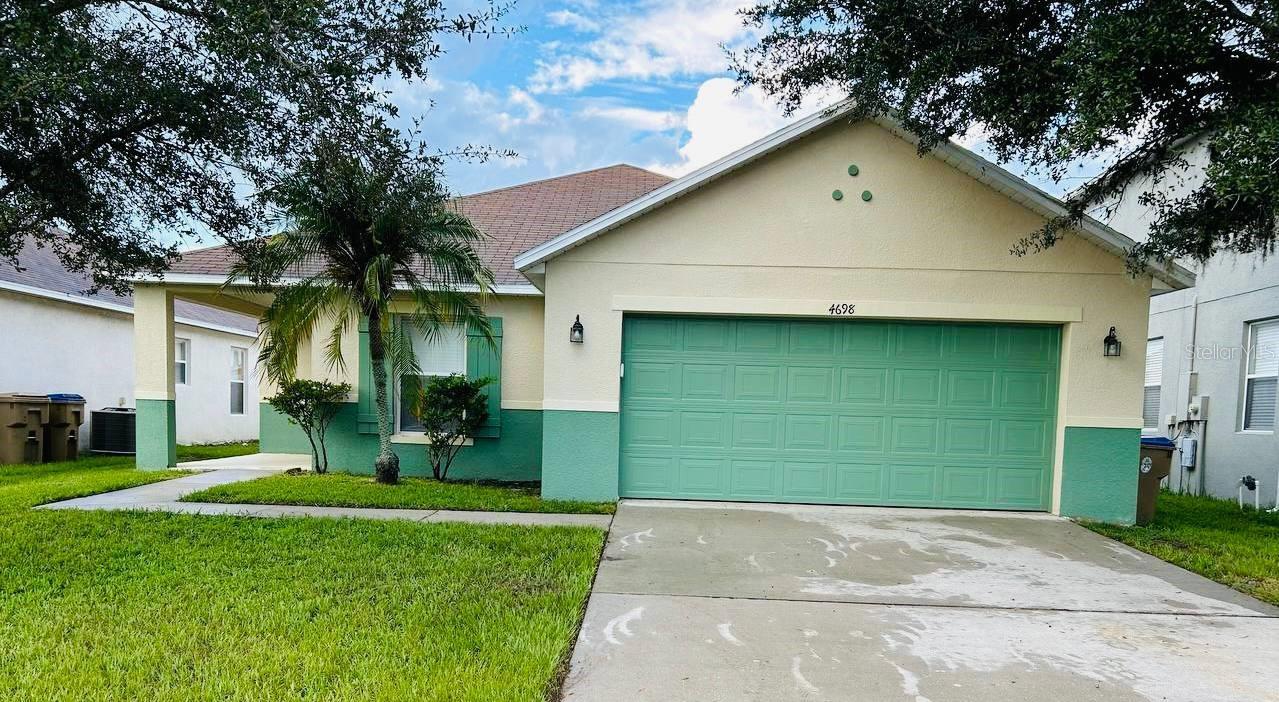 This beautiful, freshly painted 3-bedroom, 2-bath home offers 1,600 sq. ft. of light-filled, welcoming living space. Located in a peaceful Kissimmee neighborhood, this home features brand-new AC and laminate floors with no carpet, ensuring comfort and quality. Enjoy a spacious, fully fenced backyard—perfect for family gatherings or relaxing in privacy. Conveniently situated close to the Sun Rail station, commuting is a breeze, and you are minutes from local attractions and shopping. Experience the bright, sunny Florida lifestyle in this clean, inviting home, ready for your next chapter!