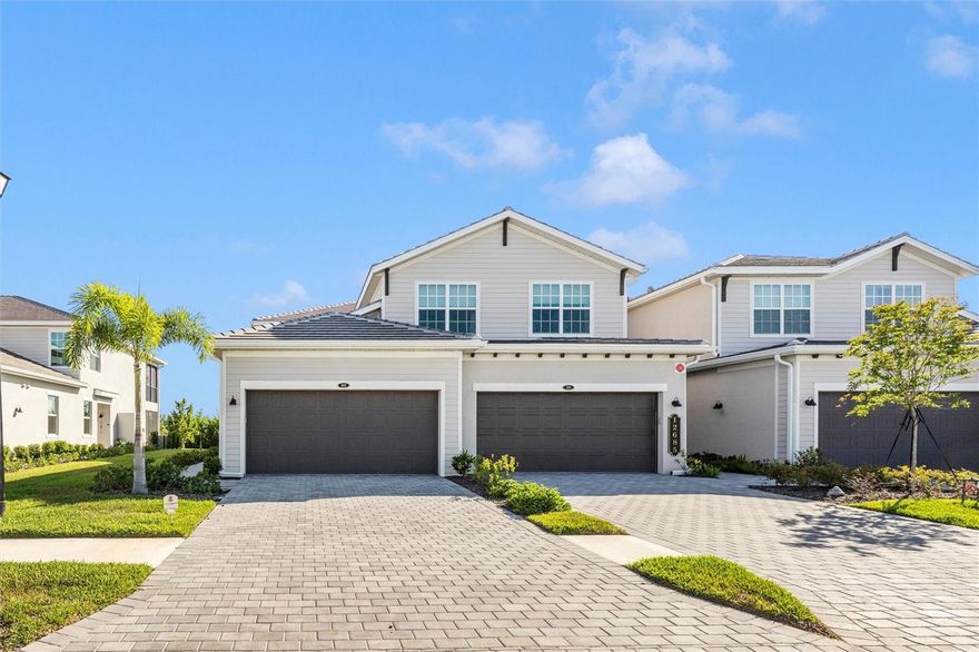 Experience resort-style living in this beautifully appointed 3-bedroom, 2-bath coach home located in the highly sought-after Wellen Park Golf & Country Club. Featuring a spacious open-concept floor plan, this home offers a bright and airy living area, tasteful upgrades to include decorative wall trim, beautiful lighting, modern kitchen with ample cabinetry and countertop space, and a private screened lanai perfect for relaxing and enjoying peaceful preserve views. The generous primary suite includes dual walk-in closets and a spa-inspired bath, while two additional bedrooms provide comfort and flexibility for guests or a home office. A 2-car garage with epoxy floors adds convenience and extra storage. Residents enjoy access to championship golf (deeded with this home), resort-style pools, clubhouse dining, fitness center, tennis, pickleball, and an active social lifestyle, all just minutes from Downtown Wellen Park, shopping, dining, entertainment, and Gulf beaches.