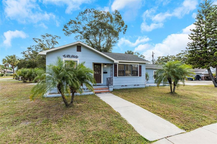 Welcome home to this charming two-bedroom, one bath home located in the heart of St. Petersburg. If character is what you are looking for then look no further! The home is nestled on a quiet street and welcomes you with tropical landscaping and a large driveway. Enter into your spacious living room with a built-in bookshelf, exposed beam ceilings, brick accent wall, and cove archways. The kitchen has been tastefully updated with wood cabinets, granite countertops, and stainless-steel appliances. Both bedrooms are light and bright! The bathroom has a modern vanity and a new stainless steel double shower. The bonus room is the perfect space for a formal dining room or at-home office. The home features hardwood floors, custom blinds, and a water softener/ conditioner. The cozy backyard is fenced with plenty of room to entertain. The over-sized garage with washer & dryer provides plenty of storage space. Conveniently located near vibrant Downtown St. Petersburg, shopping, restaurants, I-275, Tyrone mall, the pristine Gulf beaches and close to everything that nearby Gulfport has to offer. No flood insurance required! Don't delay, this one is truly a must see! Schedule your viewing today!