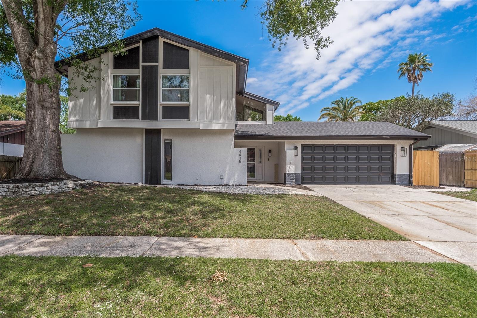 Check out this beautiful updated POOL home in the heart of Tampa! Out front, enjoy the gorgeous fresh landscaping with upgraded exterior lighting that adds to its beauty, BRAND NEW exterior paint 2023, and BRAND NEW in 2022. We are talking business in the front and party in the back! Feast your eyes on the shimmering pool through the party sliders in the the back yard complimenting the gorgeous wood-look porcelain plank tile flooring that runs seamlessly from room to room on the first floor. The abundant glass sliding doors through out the north end of the property let in a ton of natural light, giving this home a warm and inviting ambiance. Inside this beautiful galley kitchen, you will find matching appliances, stone countertops, and a window overlooking and outdoor area perfect for family picnics. The upstairs carpeted flooring has been newly shampooed for extra softness underfoot and well taken care of. Your eyelids are going to roll back when you see upstairs bathrooms that have been beautifully updated with gorgeous tile showers, new vanities, and modern fixtures. Enjoy living that true Florida lifestyle in your private backyard. Outside you will love splashing around in your sparkling pool, setting up your grill for cookouts, or lounging around and soaking in all the wonderful Florida weather! Located only minutes to multiple shopping centers, and delicious local restaurants. You will also be near I-275 for convenient travel to neighboring cities. Don’t miss out on all this home has to offer! Make your appointment today for your private tour!