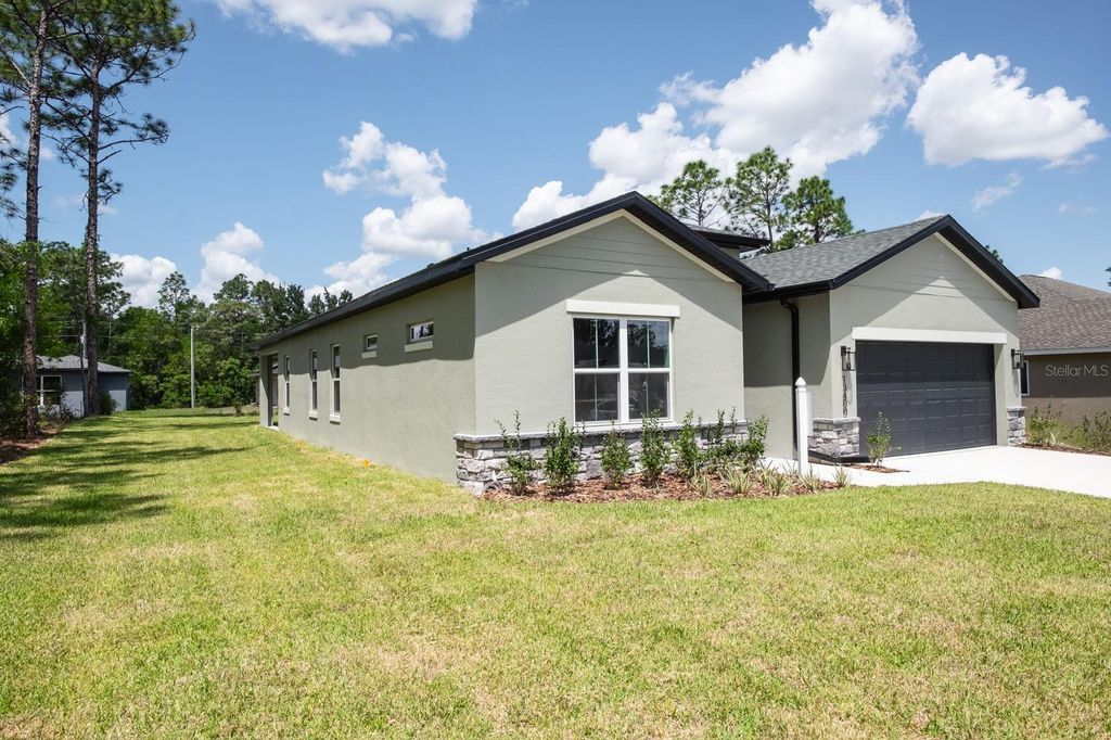 Photo of 15645 SW 19th Terrace, Ocala, FL 34473 (MLS # OM718308)