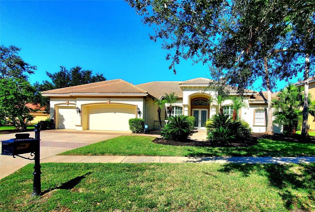 Photo of 10004 Tree Tops Lake Road, Tampa, FL 33626 (MLS # TB8420393)