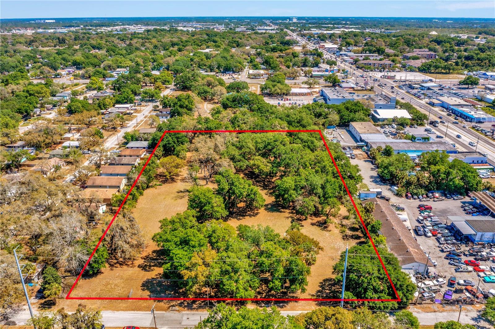 Are you a Developer, Investor or Builder searching acreage for sale in the Tampa, Florida area? If you are seeking to build a new community or subdivision in a centrally located area near Downtown Tampa, major highways & interstates of I-4/I-75/Highway 275/US-41, businesses, restaurants, family entertainment areas and city transit access - then look no further! This 5-acre parcel of developable multi-purposed land is located within the inner city core of Tampa and is located one block north of Hillsborough Avenue, two blocks west of 40th Street & a few miles in proximity to the major interstates/highways. This beautiful park-like tree setting provides fantastic residential development opportunities for creating your own city oasis, a community of single family homes or multi-family townhomes or condos or even a mega place of worship. Rezoning for commercial purposes is also a possibility. The east & south sides of the property are adjacent to several businesses off of Hillsborough Avenue to include an Auto business; Habitat for Humanity; and the Pepin Academies Tampa school. Neighboring homes line the north side of the property. Don't miss out on creating something amazing with this property!