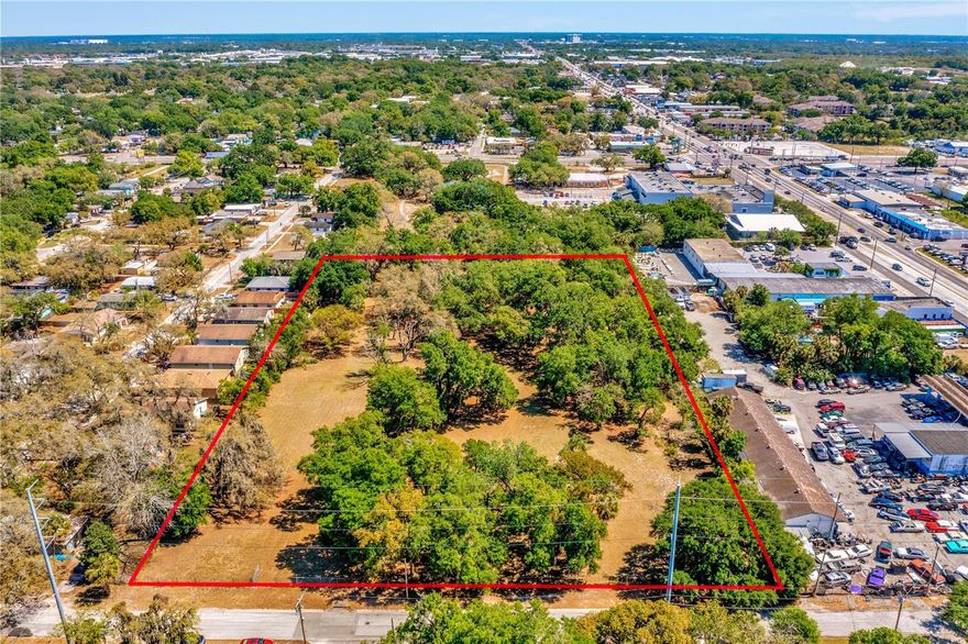 Are you a Developer, Investor or Builder searching acreage for sale in the Tampa, Florida area? If you are seeking to build a new community or subdivision in a centrally located area near Downtown Tampa, major highways & interstates of I-4/I-75/Highway 275/US-41, businesses, restaurants, family entertainment areas and city transit access - then look no further! This 5-acre parcel of developable multi-purposed land is located within the inner city core of Tampa and is located one block north of Hillsborough Avenue, two blocks west of 40th Street & a few miles in proximity to the major interstates/highways. This beautiful park-like tree setting provides fantastic residential development opportunities for creating your own city oasis, a community of single family homes or multi-family townhomes or condos or even a mega place of worship. Rezoning for commercial purposes is also a possibility. The east & south sides of the property are adjacent to several businesses off of Hillsborough Avenue to include an Auto business; Habitat for Humanity; and the Pepin Academies Tampa school. Neighboring homes line the north side of the property. Don't miss out on creating something amazing with this property!