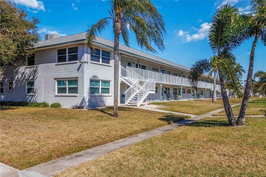 If you're looking for a well-maintained 2-bedroom, 2-bath condo located in Paradise Shores, an active and social 55+ community, this is it! The unit features upgraded windows, newer decorative wood-style flooring, an updated electrical panel, and updated plumbing. A bonus room offers flexible space ideal for a home office, media room, or hobby area. The primary bedroom includes a private en-suite bath, and both bedrooms feature California-style closets for efficient storage.

Paradise Shores offers an impressive array of amenities including shuffleboard, bocce ball, a swimming pool, outdoor grilling areas, and multiple seating spaces to relax and enjoy the Florida sunshine. The clubhouse hosts parties, dinners, and dancing, and features a stage for performances, a billiards room, library, and card game room. Conveniently located within walking distance to Publix, banking, and shopping. A short 10–15 minute drive provides easy access to Tyrone Square Mall, the VA hospital, and area beaches! Start living the Floirida lifestyle today!