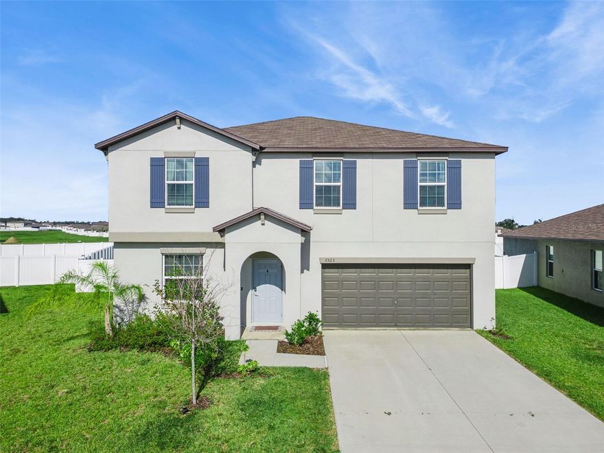 Welcome to this spacious and beautifully designed 4-bedroom, 2.5-bathroom single family home in the desirable Wind Meadows South community of Bartow. This Providence floorpan by Lennar was Built in 2024, this two-story residence features over 2500 sq. ft. of living space and modern construction with stylish stucco accents. The open-concept main floor seamlessly connects the family room, dining area, and modern kitchen; showcasing sleek stainless-steel appliances, ceramic tile flooring, and plenty of room for entertaining or everyday living.?

Upstairs, you’ll find a generous primary suite with a walk-in closet and en-suite bath, three additional spacious bedrooms, a versatile loft, and ample closet space throughout. The home includes an upstairs laundry for convenience and a 2-car attached garage. Smart home technology and energy-efficient fixtures add to the comfort and value.?

Situated on a fully fenced, oversized lot with extra rear patio space, this property offers access to resort-style amenities, including a sparkling community pool, multiple playgrounds, and dog park. With low HOA dues, lush landscaping, and beautiful greenery views, Wind Meadows South is ideal for relaxed Florida living. Top-rated Polk County schools; Spessard L. Holland Elementary, Bartow Middle, and Bartow Senior High are all within minutes.?

Enjoy nearby shopping, dining, and easy access to main highways, making commutes simple. This is a rare opportunity for a contemporary move-in-ready home in one of Bartow’s fastest-growing neighborhoods. Schedule your tour today!