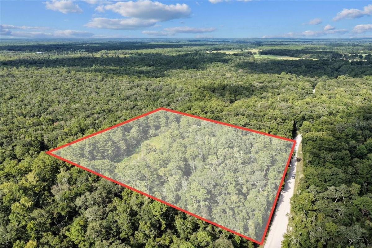 Amazing 5.74 acres (lot next door available also ) perfect for camping , hunting and enjoying the great outdoors! This property is located in Gilchrist County a short drive to the great Suwannee River. Total acreage with neighboring lot is 11.88 acres. Property is in flood zone AE/FW. Beautiful Florida hardwords and wildlife galore, call today for more information!