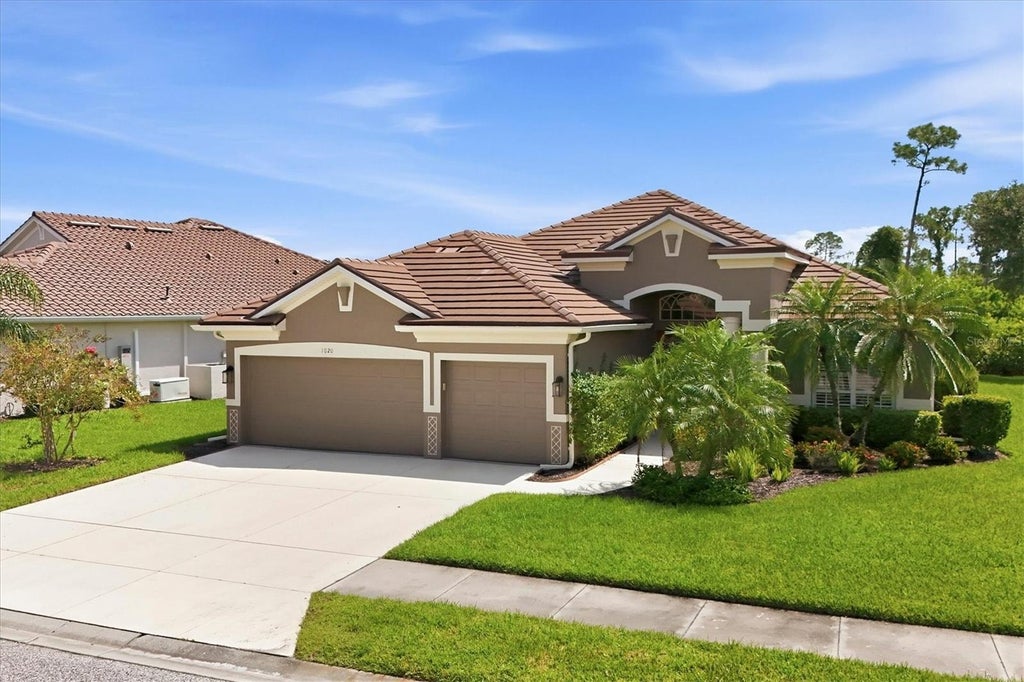 Photo of 1020 Creek Nine Drive, North Port, FL 34291 (MLS # A4707456)