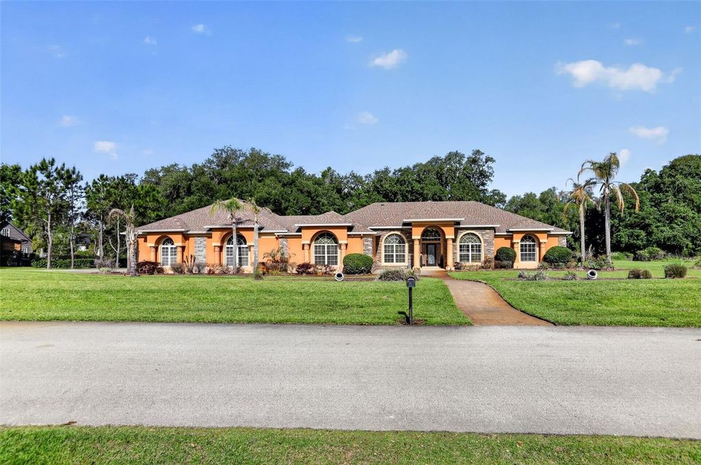 Photo of 10107 Tween Waters Street, Clermont, FL 34715 (MLS # G5110610)