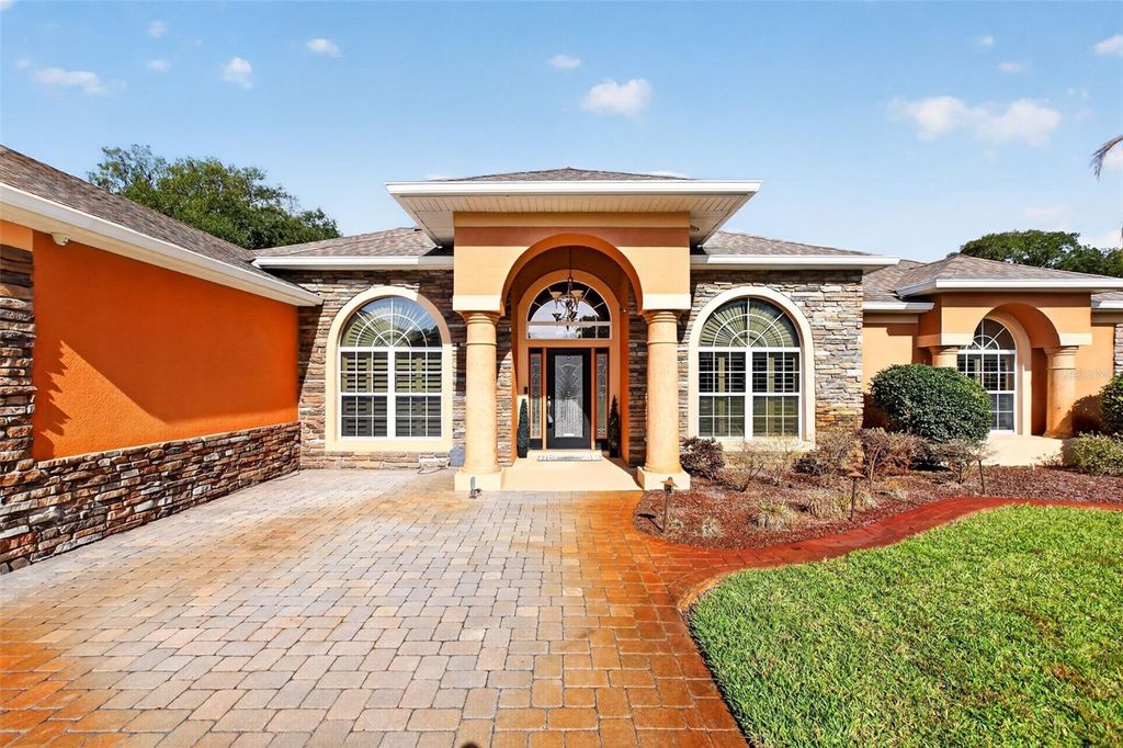 Photo of 10107 Tween Waters Street, Clermont, FL 34715 (MLS # G5110610)