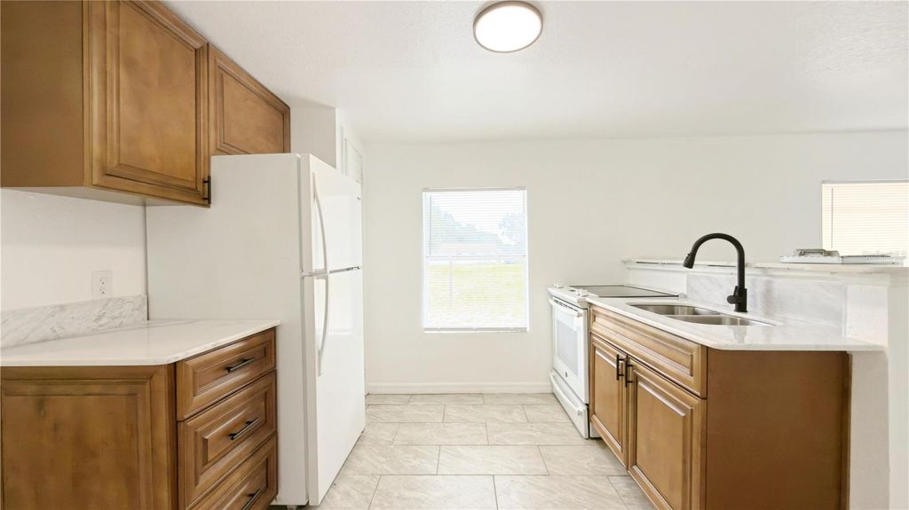 Photo of 713 Sears Avenue NE, Winter Haven, FL 33881 (MLS # TB8458814)