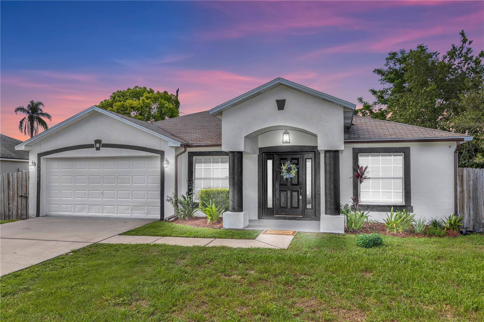 Location location location!!! Welcome to this stunning 3 bedroom 2 bathroom modern home with formal Living Room and Dining Room plus Family Room. Kitchen Opens to a spacious welcoming family Room. This home features a convenient split bedroom plan, en suite bathroom in primary bedroom, and inside laundry room. Fresh paint and new carpet throughout!!! New Stainless steel appliances and lighting. Relax or entertain in the screened in back porch via the double french doors. Privacy fencing in back and side yard. Easy access to I-4. Conveniently located between Orlando and Daytona Beach.