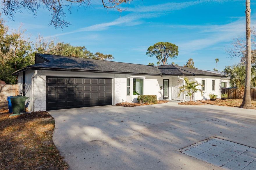 Welcome to 1762 Bayshore Blvd, a beautifully updated 3-bedroom, 3-bath, 2-car garage pool home offering 1,689 square feet of comfortable Florida living in one of Dunedin’s most desirable locations. Just minutes from charming downtown Dunedin and a short drive to Honeymoon Island State Park, this home places you at the center of a vibrant coastal lifestyle.

Inside, you’ll find laminate flooring throughout the main living areas and porcelain tile in the two primary bathrooms. The open kitchen and dining space is ideal for gathering and entertaining, featuring granite countertops, stainless steel appliances, and a stylish tile backsplash. The spacious primary suite offers a private en-suite bathroom and walk-in closet. A third full bathroom is conveniently located in the garage, along with the laundry area.

Step outside to your fully fenced backyard retreat, where a recently updated in-ground pool with screened enclosure creates the perfect setting for relaxing or entertaining year-round.

Living in Dunedin means enjoying locally owned restaurants, boutique shopping, craft breweries, waterfront parks, and year-round festivals. You’re just minutes from TD Ballpark, the spring training home of the Toronto Blue Jays, as well as the Pinellas Trail for biking and walking. With world-renowned Gulf beaches, boating access, and stunning sunsets nearby, this home offers the perfect blend of comfort, convenience, and coastal charm.