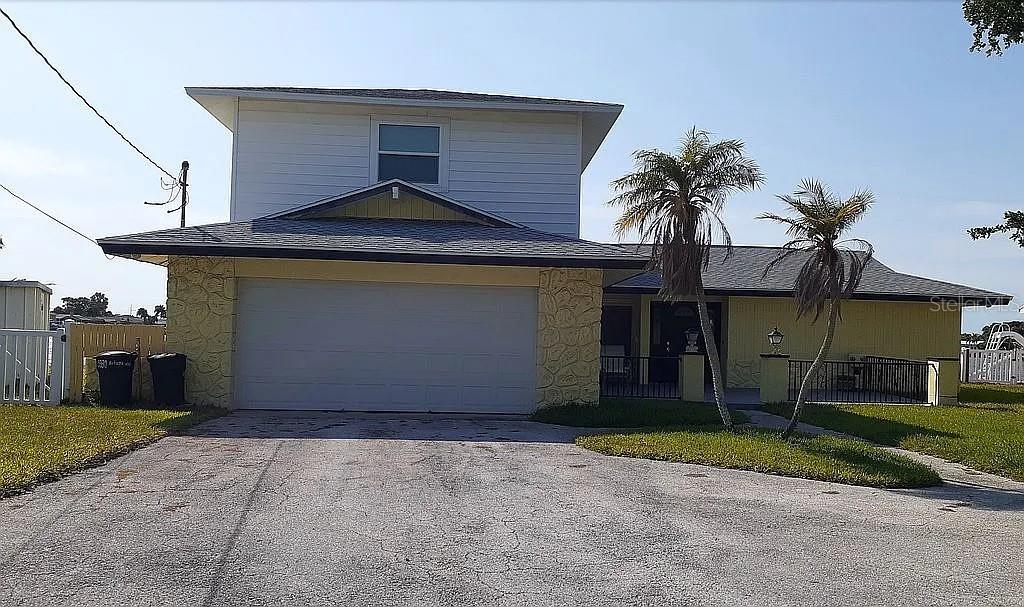 Water front opportunity, two story (5 bed/3 bath) nestled in desirable Bahia Shores on St Pete Beach(Sunset Capital). This Home sits on double wide water front, cul-de-sac and double lot size, its one of the largest properties of St. Pete Beach Barrier Island overlooking 133.47 feet of Waterview. Remodel/rebuild/rehab loans are great options!!
This property, has had 3 truckloads of dirt raising the sea wall an extra foot, and a new sea wall cap built. Walk 4 Blocks to the center of this spacious Long Island of St Pete Beach, where you will find all the best activities, water sports, restaurants, and entertainment. This large irrigated property is situated on a quiet cul-de-sac where water surrounds you everywhere, so you are never looking at neighbors, but a vast body of water. Enjoy the Gulf Breeze as you watch the beautiful sunsets from your yard or stroll the beach. Watch Dolphins play from your backyard, set crab traps or fish to your heart’s content. The water is sailboat keel deep. There is room for a large dock and pool. The view is breathtaking of the inter-coastal waterway leading minutes to the Gulf of Mexico. A very affluent, quiet & safe neighborhood. On July 4th, you never have to leave your yard to see the fireworks display. The Community Activity Center offers many classes, a Gym that overlooks the water, a massive swimming pool, and a concert area. Choose to remodel this unique 5 Bedroom 3 Full Bathrooms split plan with 2 Master Bedrooms on first floor & a 3rd Bedroom or Flex Room, and a 2 bedroom second floor apartment that sleeps 6 with Full Bathroom, kitchen & Living room for guests, a mother daughter, or rent it during season to pay your property taxes. Buy and build a “Dream Mansion”.