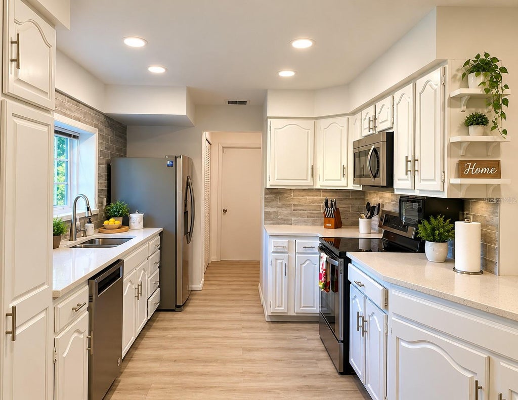 Photo of 5144 Pine Tree Lane, Wesley Chapel, FL 33543 (MLS # TB8351090)