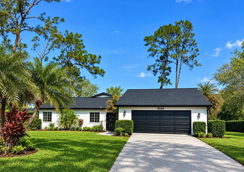 Photo of 5144 Pine Tree Lane, Wesley Chapel, FL 33543 (MLS # TB8351090)