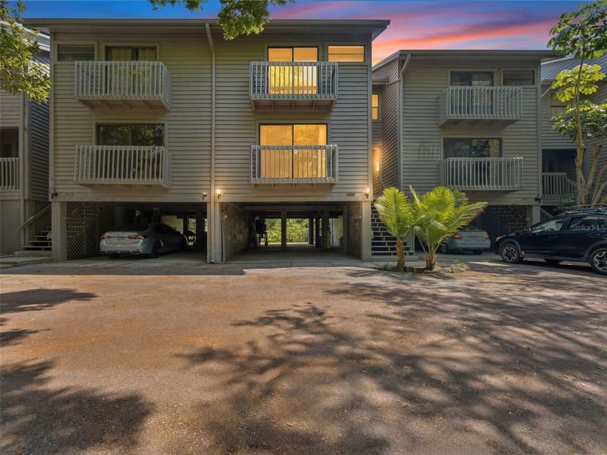 Welcome to your own private retreat nestled among the trees—where nature, tranquility, and peace of mind come together in one exceptional townhome. This beautifully maintained, elevated residence offers nearly 2,000 square feet of light-filled living space, complete with a 2-car carport and a layout designed for both comfort and entertaining. Surrounded by lush greenery and mature trees, the home
feels like a secluded treehouse with soaring 30ft cathedral ceilings and transom windows beaming in natural light. Inside, you’ll find spacious living areas, a spacious open floor plan, and a warm, inviting atmosphere that immediately feels like home. Whether you’re enjoying your morning coffee with serene views of nature or hosting friends and family, this home offers the
perfect balance of relaxation and functionality. Enjoy a western view of the morning sunrise from one of your two patio decks. Overlooking the conservation you’ll become acquainted with many neighborly herons, blue jays, cardinals, otter, turtles and sandhill cranes to name a few. 

Unexpected extras include: Roof 2020, HVAC 2025, Ikea Closet Organizers, 2-Car Covered Carport, New Low-Flow Toilets, Luxury Plank Vinyl flooring in main living areas, and HIGH and DRY elevation when seller has never paid for flood insurance. The current homeowner experienced no interior damage during recent storms with this home being fully elevated outside of the flood plain, offering
a significant reassurance for buyers seeking resilience in coastal Florida living.

The Arbor Trace community is a small community of 33 townhomes and offers comprehensive HOA coverage that includes the following: basic cable, high-speed internet, building and flood insurance, exterior maintenance, roof replacement, community pool and spa maintenance, and exterior pest control. Additionally, the community pool (lap pool) and spa are maintained by the HOA for all residents to enjoy.  Conveniently located near Largo Datsko Park for more outdoor enjoyment including trails, playground for the little one and picnicking sites. Nearby shopping, dining, medical facilities, and Florida’s sugary sand beaches make this home you should not pass up. Enjoy access to community amenities while being tucked away in a peaceful, nature-filled setting that feels miles from the ordinary. Schedule your visit today!