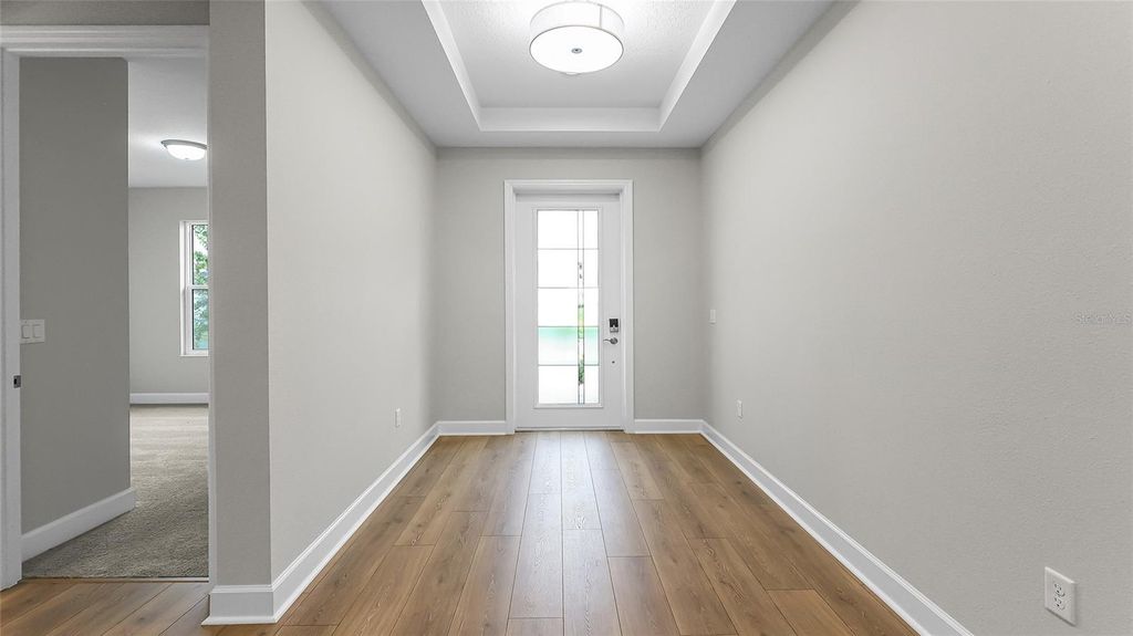 Photo of 1613 Bellagio Loop, Tavares, FL 32778 (MLS # W7885896)