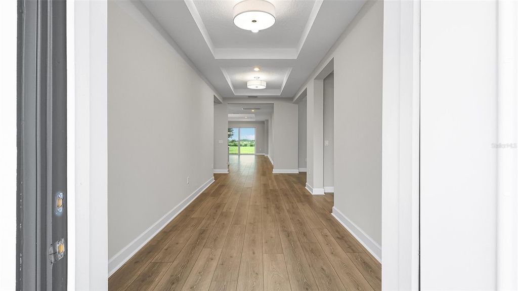 Photo of 1613 Bellagio Loop, Tavares, FL 32778 (MLS # W7885896)