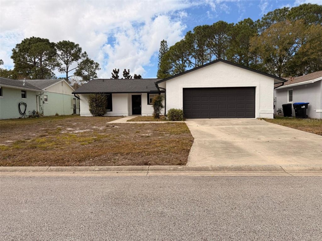 Photo of 10616 Leafy Way, Orlando, FL 32821 (MLS # O6378107)