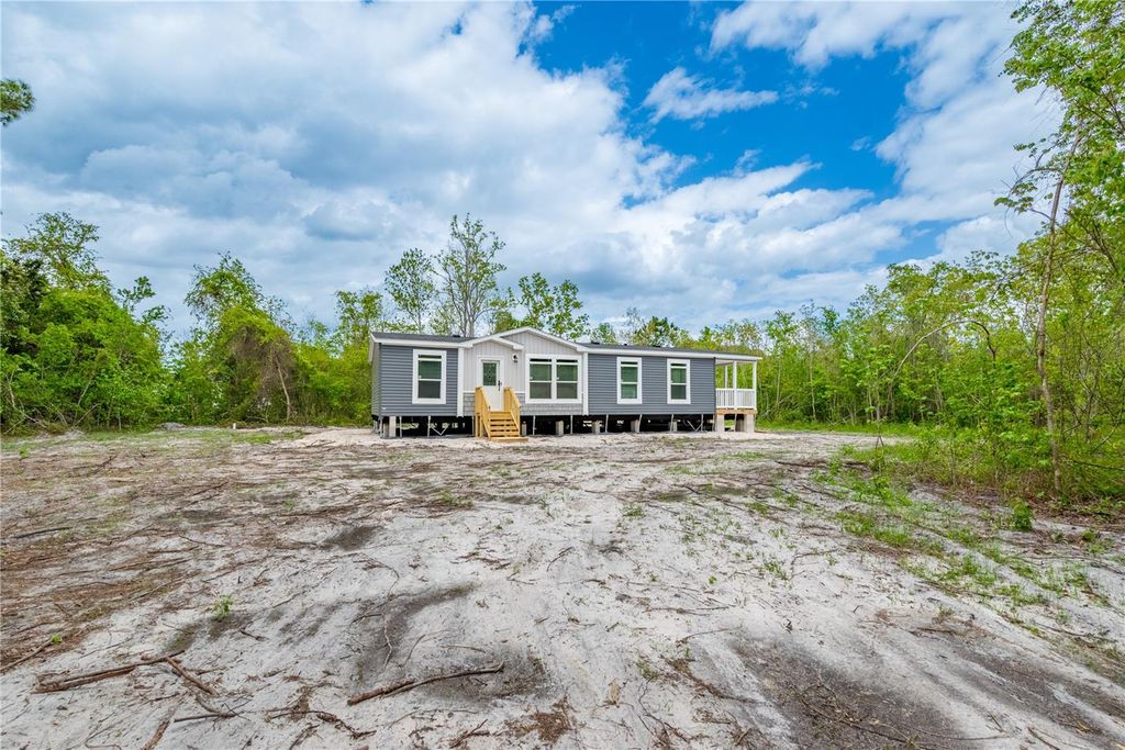 Photo of 14823 SE County Road 100a, Starke, FL 32091 (MLS # GC539124)