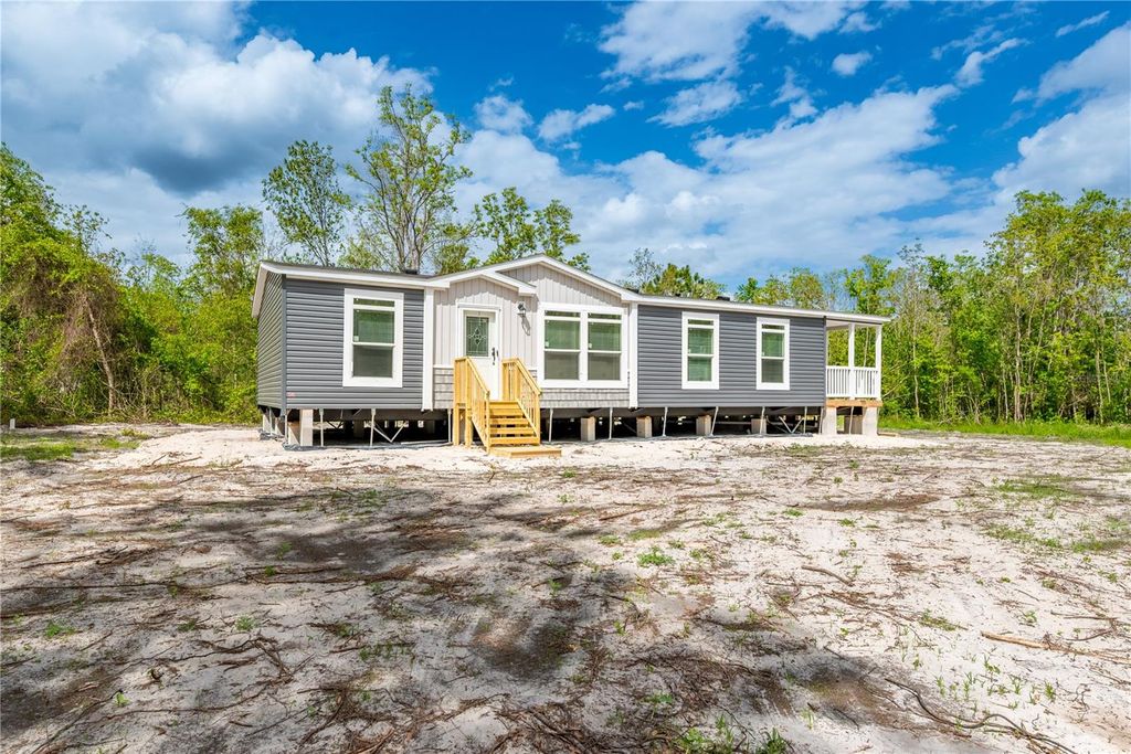 Photo of 14823 SE County Road 100a, Starke, FL 32091 (MLS # GC539124)
