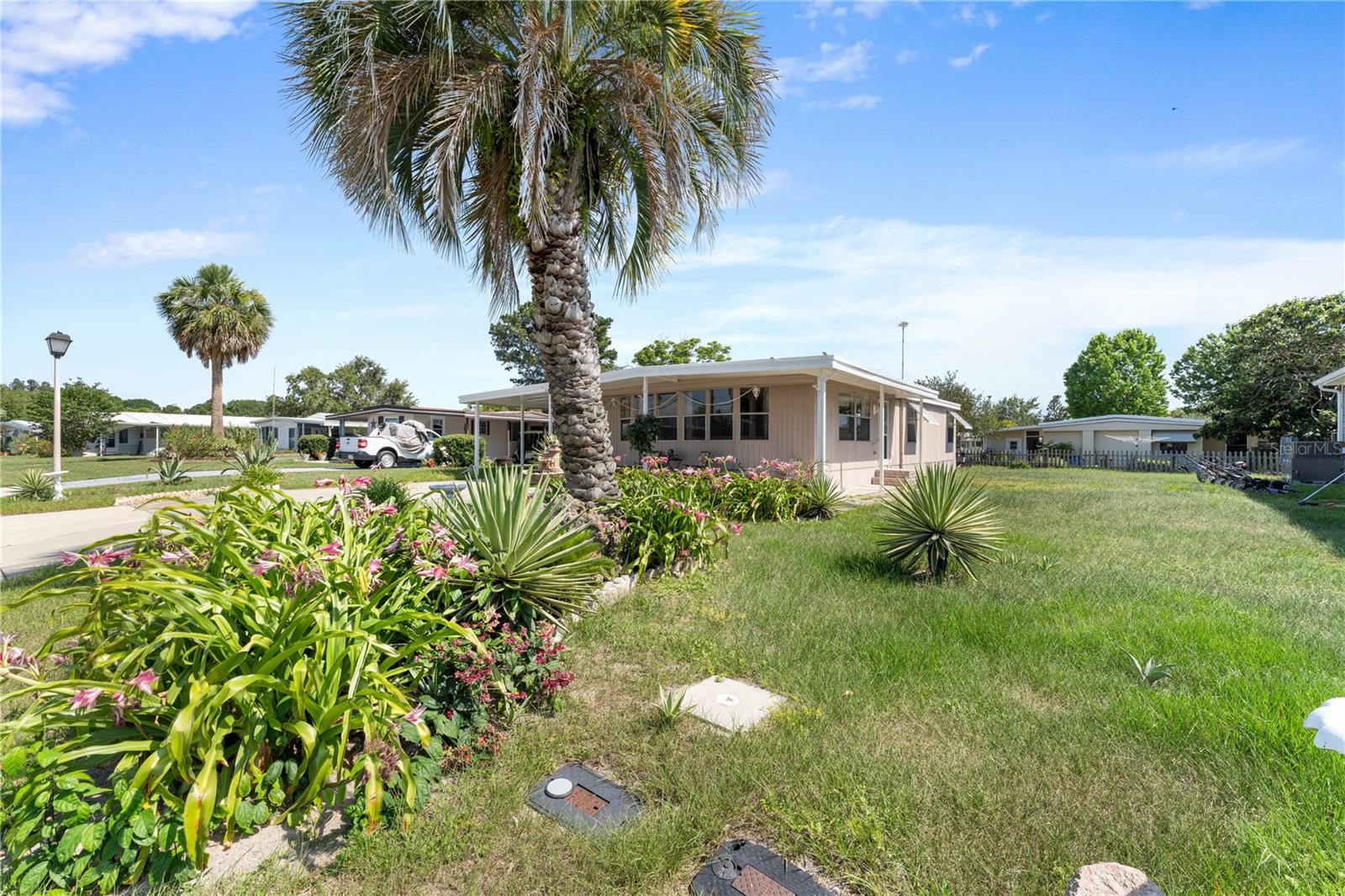 Seller is willing to work with the buyer on the floor. Membrane roof installed in 2016. A home located in the middle of Tavares with easy access to shopping and other areas. This beautifully renovated 2-bedroom, 2-bath home offers comfortable living with stylish updates throughout. Featuring ceramic tile flooring in every room, this home is both elegant and easy to maintain. The spacious kitchen boasts a brand-new island, modern cabinetry, and a contemporary layout perfect for entertaining or everyday living. Both bathrooms have been tastefully updated with sleek finishes and fixtures. A standout feature of this property is the custom-built laundry and storage room—designed with practicality in mind, it offers plenty of space to organize and unwind. The second bedroom, located near the front of the home, has been thoughtfully opened up to function as a versatile space—ideal for a home office, study, or crafting area. The open-concept living area is bright and airy, filled with natural light and offering a welcoming atmosphere throughout. Don’t miss this move-in-ready gem that combines functionality, comfort, and style in every corner.