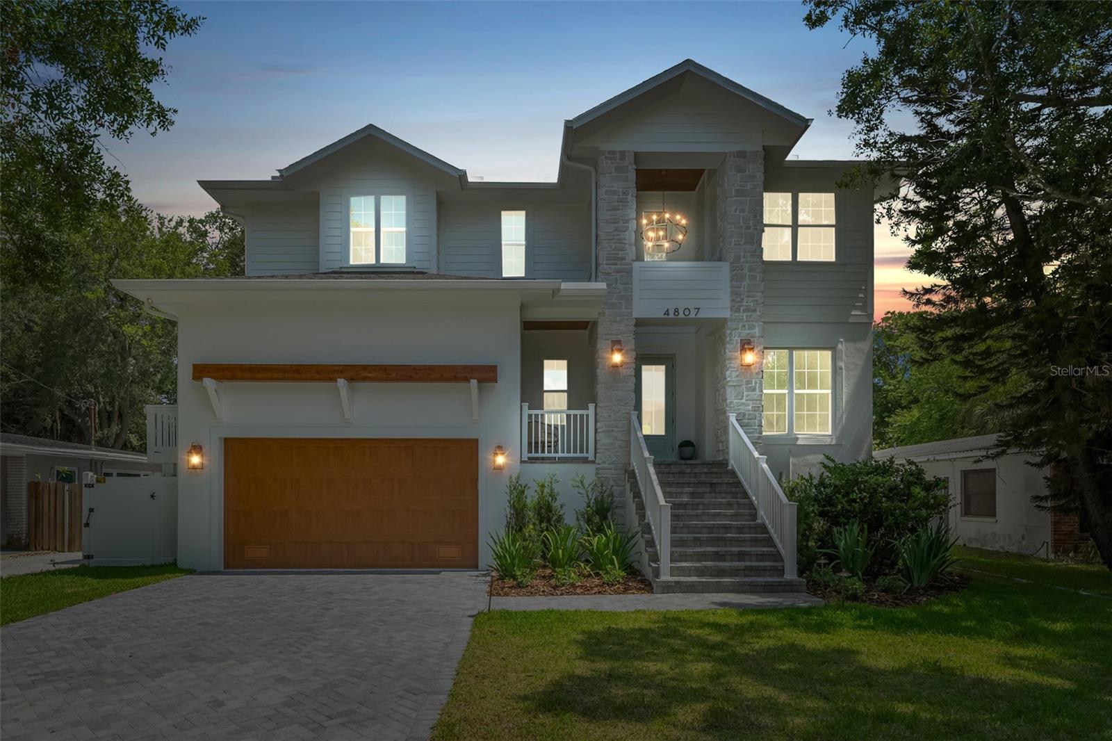 JUST COMPLETED AND MOVE IN READY! Introducing your dream home located in the highly sought-after Sunset Park neighborhood of South Tampa! Which means...Plant High School District! This exquisite coastal contemporary new construction residence features 5 bedrooms, a media room, and 4 bathrooms. Offering luxurious finishes and custom details throughout. Upon entering, you'll immediately appreciate the spacious mudroom, designed to keep your home tidy and organized. The ground floor showcases 10ft ceilings, and the kitchen is a chef's dream, equipped with quartz countertops, solid wood cabinets going all the way up to the ceiling, a custom-built range hood, a 6 burner gas range, and top-of-the-line Thermador appliances. Discover the hidden butler's pantry concealed behind the kitchen cabinets with a secret passageway that leads to the dining room. There’s a bedroom on the ground floor just off the full bathroom and pool access, making it ideal for accommodating guests. Upstairs, you'll find four additional bedrooms, plus a huge media room. The home is thoughtfully insulated with spray foam, ensuring energy efficiency and year-round comfort. Outside, the spacious backyard is perfect for outdoor gatherings and leisure activities, featuring a pool with an attached spa and an outdoor kitchen for the ultimate in luxury living. The backyard also has a new white PVC fence, fresh sod, and an irrigation system. Most of the plants were even carefully curated to include mosquito repellant plants that way you can enjoy the outdoor space even more! The curb appeal will wow you with stunning stonework and elegant light fixtures. The expansive 2-car garage offers ample storage space and high ceilings for your convenience. Don't miss out on the chance to own this extraordinary new construction residence in Sunset Park. Contact us today to arrange a tour and make this stunning home yours! You can even buy the house with all the furniture from Sublime Staging if you like so you can move right in!