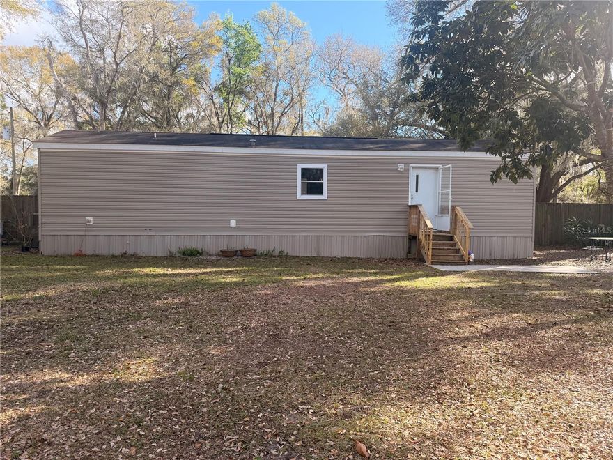 Package deal opportunity! Discover the possibilities with this unique agricultural 6.7-acre property in Brooksville, featuring two manufactured homes with two separate property addresses, situated on the same parcel, with the land included in the sale. The primary residence is a 2015 single-wide manufactured home offering 2 bedrooms, 1 bathroom, and approximately 728 square feet of living space. The second structure is a 2020 double-wide manufactured home offering 3 bedrooms, 2 bathrooms, and approximately 1,344 square feet. The property also includes a barn and ample open space suitable for animals, gardening, recreational vehicles, or additional storage. Enjoy the privacy and peaceful setting of country living while still being within a short drive to Brooksville’s shopping, dining, and major roadways. Property is being sold as a package including both manufactured homes and the 6.7-acre parcel. Buyer to verify all property details, addresses, uses, permits, and measurements.