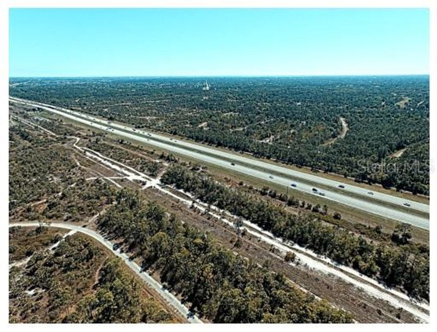 This vacant land offers an exceptional opportunity in one of North Port’s fastest-growing corridors. Zoned Activity Center 6 (AC6), the property allows for a wide range of potential commercial, mixed-use, and multifamily development options—ideal for investors and developers seeking long-term upside.

The lot is approximately 10,000 square feet, providing flexibility for various development possibilities.

Strategically located near Interstate 75, the property benefits from excellent visibility, convenient access, and strong growth potential in a rapidly expanding area.

AC6 zoning permits a variety of uses, including retail, office, service businesses, light industrial, warehousing, distribution, and multifamily residential (density subject to city approval). All uses, densities, and development plans must be verified with the City of North Port and are subject to site plan approval and applicable regulations.

Seller financing may be available, subject to seller approval and mutually agreed terms. Terms, rates, and conditions are not guaranteed and will be determined at closing.