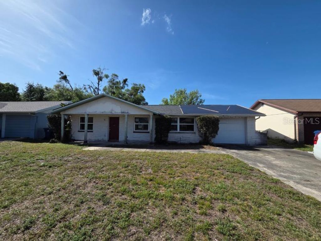 Photo of 7146 Carmel Avenue, New Port Richey, FL 34655 (MLS # O6399119)