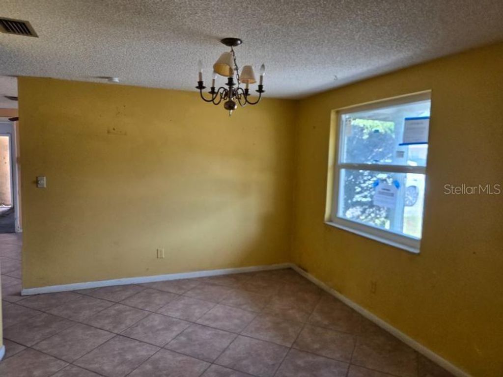 Photo of 7146 Carmel Avenue, New Port Richey, FL 34655 (MLS # O6399119)