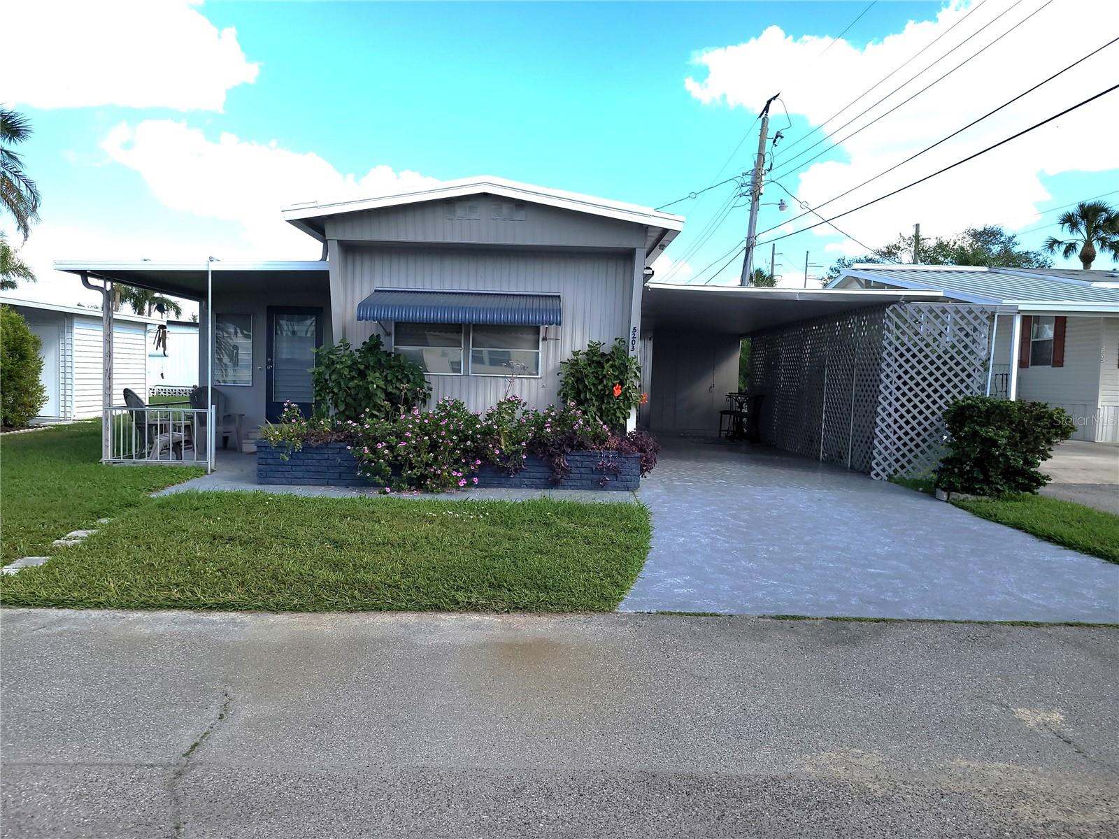 REDUCED for a QUICK SALE. This home is a steal at this price!! It's an adorably 2 bed, 1.5 bath home that's the perfect oasis. Whether you live here all year round or you only come to FL to get away from the cold, you will love your new home in the Golf Lakes community. This home host ample, bright open spaces, lots of natural light, and room to move about easily. The Large Primary bedroom has enough space for a queen or king bed along with nightstands and other items. It also has 2 separate closets and a 3 tier built-in dresser along w/vanity/work desk space with enough storage to fulfill your needs. The large second bedroom can double as an office, work room, overall additional living space or guest suit with it's own private entrance, half bath, etc.
This golfing community has super low HOA fees, and they even include water, sewer, cable, internet and all year around access to these amazing amenities. The amenities include a heated pool, Jacuzzi spa, 9-hole golf course, fitness room, sauna, two pickle ball courts, shuffleboard courts, lawn bowling, and fishing in any of the four different lakes, throughout the community! Want to make new friends or join a club to keep busy? There are also many new clubs and activities to pick from. And the best party...they meet right at your new clubhouse! This wonderful golf community is conveniently located with shopping, dining, beaches, and medical facilities all nearby. Call today to schedule your appointment today and make this your new home away from home!.