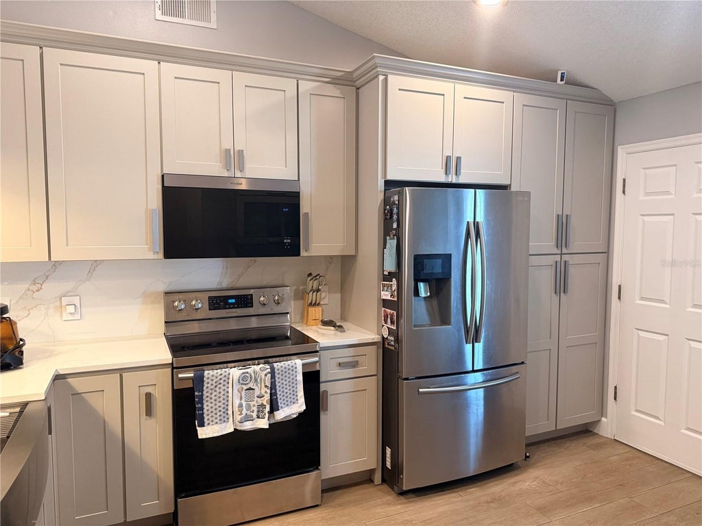 Photo of 232 Crestwood Pass, Davenport, FL 33897 (MLS # S5154402)