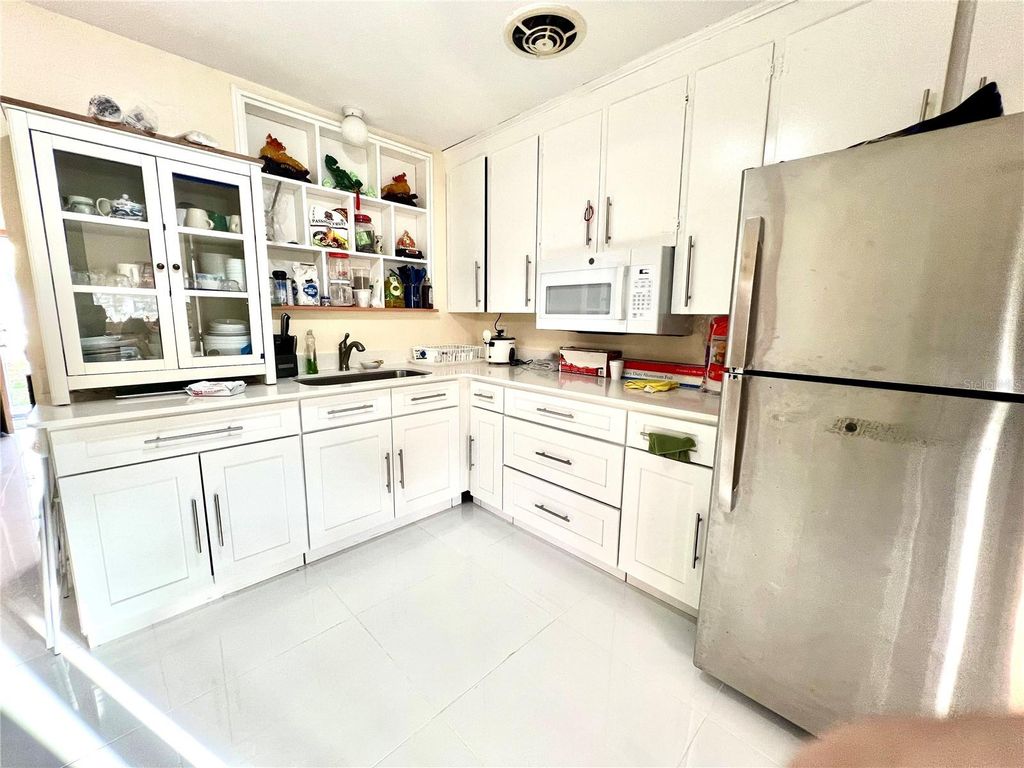 Photo of 5009 Deauville Drive, Orlando, FL 32808 (MLS # S5147596)