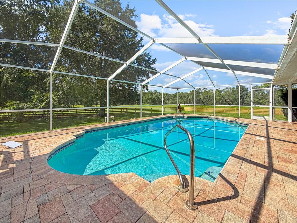 Photo of 15561 Patriot Drive, Brooksville, FL 34601 (MLS # TB8556440)