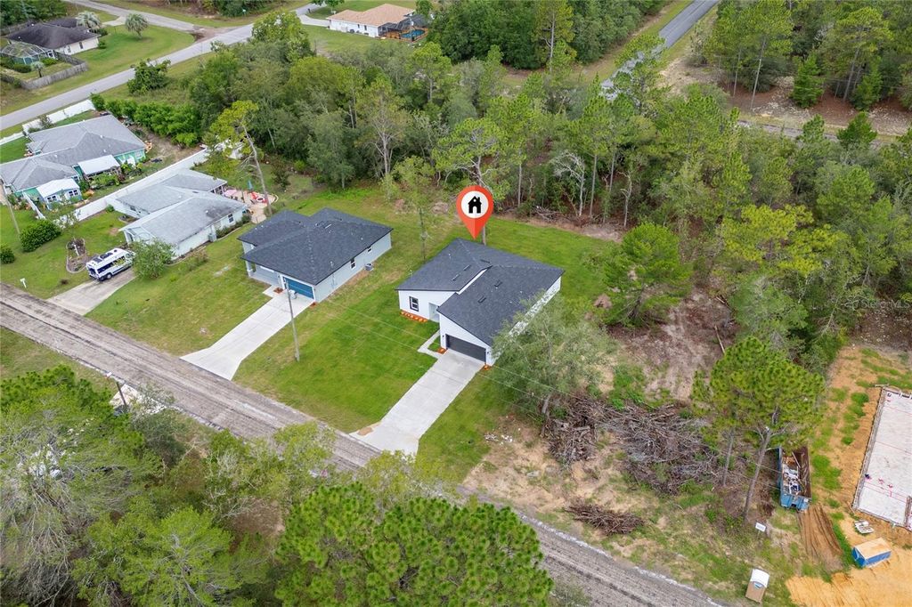 Photo of 9312 N Akola Way, Citrus Springs, FL 34434 (MLS # O6385102)