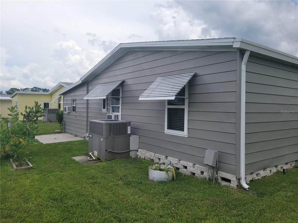 Photo of 345 Victoria Drive, Haines City, FL 33844 (MLS # P4939970)