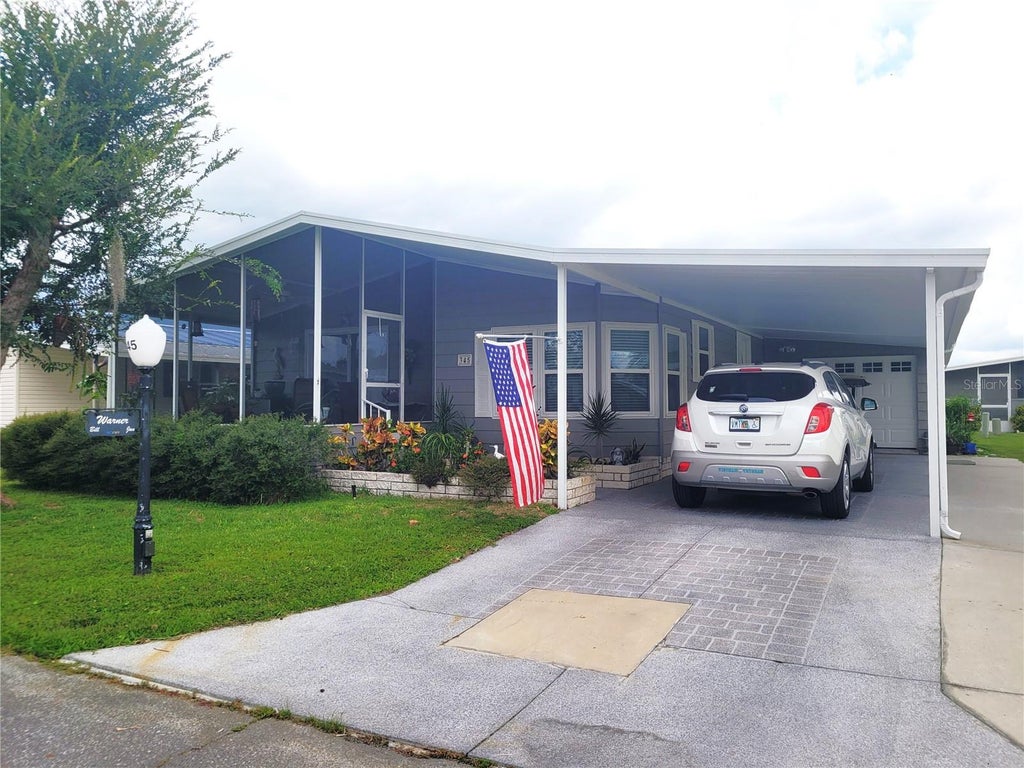 Photo of 345 Victoria Drive, Haines City, FL 33844 (MLS # P4939970)