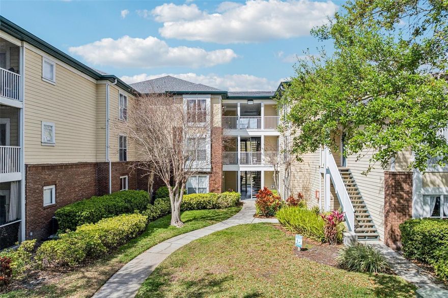 Tucked within the gated community of The Landings of Tampa, this 2 bedroom, 2 bathroom top floor condo with a lakefront view feels like stepping into your own quiet corner of Carrollwood. This move-in ready home also offers the option to include furnishings for a seamless transition. Inside, the open layout with laminate wood flooring throughout connects the living room, dining area, and kitchen in a way that keeps everyday living simple and relaxed. The kitchen features granite countertops with space for barstool seating, stainless steel appliances, and a pantry closet for extra storage. An in-unit washer and dryer adds to the convenience. Large windows bring in plenty of natural light. The owner’s suite includes a walk-in closet and an ensuite bathroom, and the split bedroom floorplan offers privacy with the second bedroom located near the guest bathroom. The screened balcony overlooking a peaceful pond quickly becomes a favorite spot to ease into the morning or wind down in the evening.

The community enhances the lifestyle with a clubhouse, pool and hot tub, fitness center, tennis courts, a sand volleyball court, picnic areas, pet stations, and an on-site car wash. Mature landscaping and two fountain lakes create a calm and well maintained atmosphere. The location puts everything within reach. Restaurants, shopping, entertainment, and public transportation are just minutes away. Nearby favorites include Carrollwood Commons, Citrus Park Mall, Sacred Pepper, and Carrollwood Deli. Outdoor lovers can enjoy Carrollwood Village Park, Northdale Golf and Tennis Club, and several nearby lakes perfect for kayaking and paddle boarding. Sports fans and theme park enthusiasts will appreciate being close to Raymond James Stadium, the Carrollwood Cultural Center, Busch Gardens, and ZooTampa. Gulf Coast beaches are also a quick drive whenever you want a day in the sun. With pet friendly policies, flexible rental options, and a low maintenance lifestyle, this condo offers an affordable and updated place to call home in the heart of one of Tampa’s most loved communities.