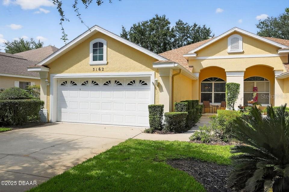 Beautifully maintained 3 Bedroom, 2 Bath Golf Villa located in the desirable Halifax Plantation community offering easy living at its best! This Fully Furnished with a 2-car garage features spacious living areas including a living room, dining room or great room, breakfast bar, and kitchenette all enhanced by soaring 10-foot ceilings and decorative plant shelves. The expansive primary suite offers a bright and airy bath with raised double sinks and a walk-in shower. A versatile center bedroom with double entry doors and a large closet makes the perfect den, office or 3rd bedroom. Step outside to the screened lanai and enjoy tranquil views of the wooded preserve with abundant privacy and deer sightings. Offered at a great price, this move-in ready villa is a wonderful opportunity to enjoy the Halifax Plantation lifestyle!
Halifax Plantation's master community amenities (available with optional membership) include a resort-style pool, fitness center, tennis courts, a championship golf course, and a full-service clubhouse with restaurant and bar.
Conveniently located near beaches, shopping, dining, and major travel routes, I-95, this home combines privacy, comfort, and an active lifestyle in a well-maintained community.
HOA fees cover complete lawn care, irrigation, shrubbery, mulching, exterior painting, pressure washing, and pest control. Newer roof, AC, & water heater and Fully Furnished allows you peace of mind.