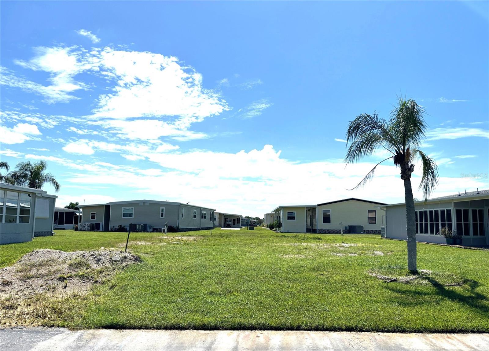 Vacant lot in a vibrant 55+ community! La Casa offers the ultimate Florida lifestyle. We have 974 homes nestled among a variety of native trees with spacious common grounds surrounding our eight lakes. Located between Sarasota and Fort Myers, this is a boater's dream with access to the Gulf of Mexico. It is convenient for shopping, sightseeing, golfing, fishing, and boating, as well as all the culture and elegance the Southwest Florida area is noted for. La Casa may have the best pools in the area. Our crown jewel is an extremely large, 40 X 60-foot swimming pool that is kept at a perfect 87 degrees. Our smaller 20 x 40 pool is quietly nestled between the clubhouse and the Activity Building. Both pools have adjacent hot tubs which are ideal for soaking muscles that are tired from golfing or tennis. Wireless Internet (Wi-Fi) is available at the Clubhouse, Activity Building, and Recreation Hall area where these pools & spas are located, so you can catch some rays while you catch up on your email! Sound enticing? Come for a visit to this self-contained oasis and see for yourself why La Casa is the ultimate destination for both snowbirds and year-round residents!