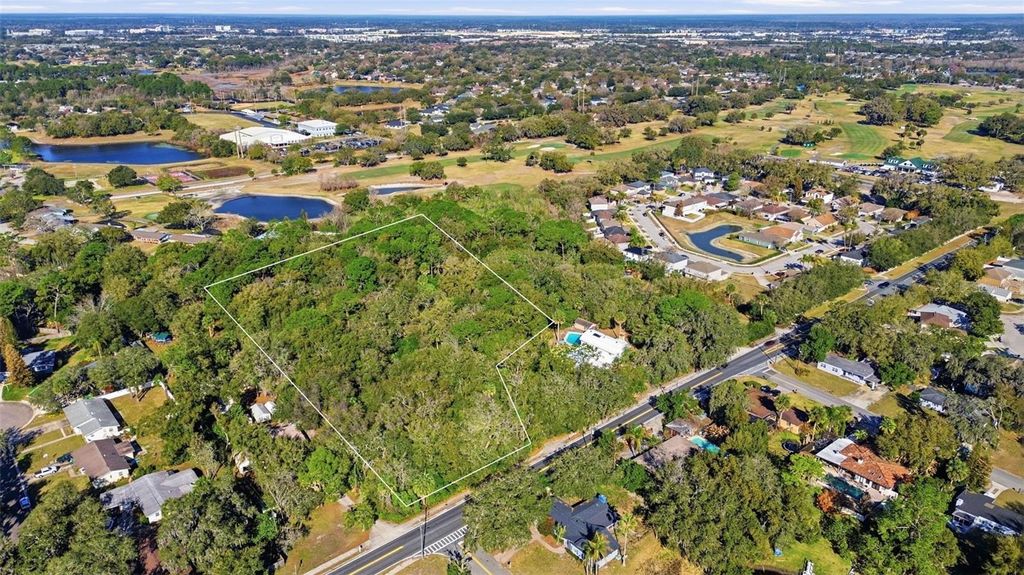 Photo of 932 Country Club Road, Sanford, FL 32773 (MLS # O6385647)