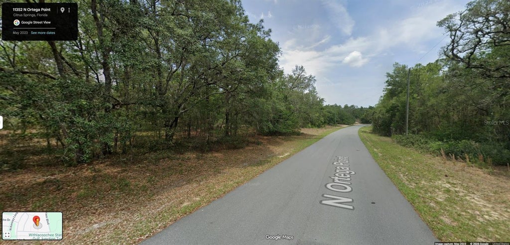 Photo of 11352 N Ortega Point, Citrus Springs, FL 34433 (MLS # OM730213)