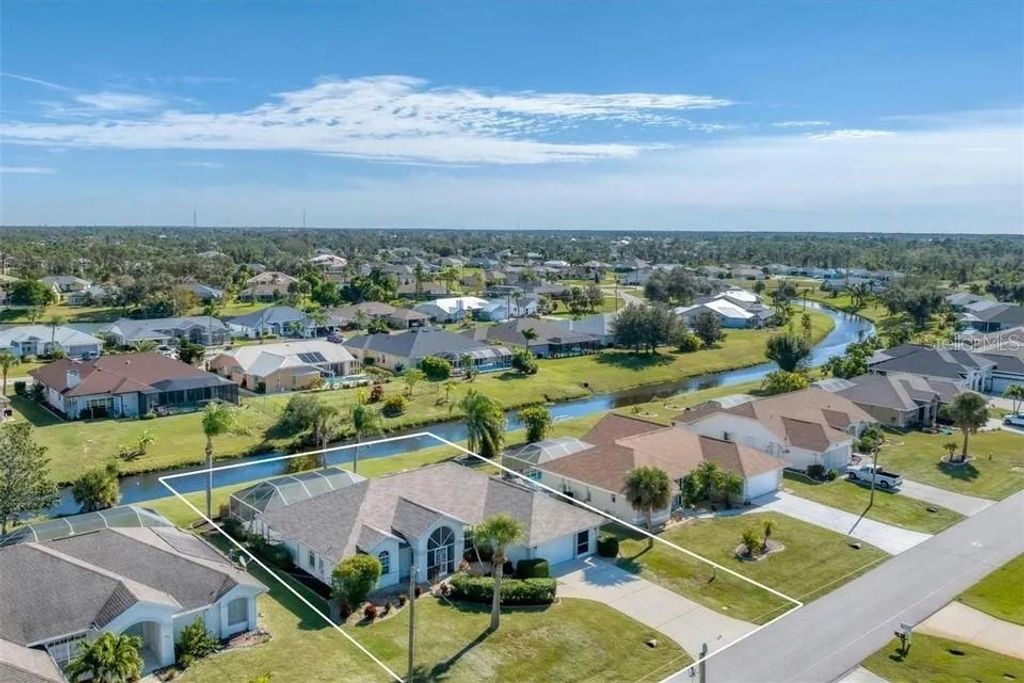 Photo of 116 Broadmoor Lane, Rotonda West, FL 33947 (MLS # A4653960)