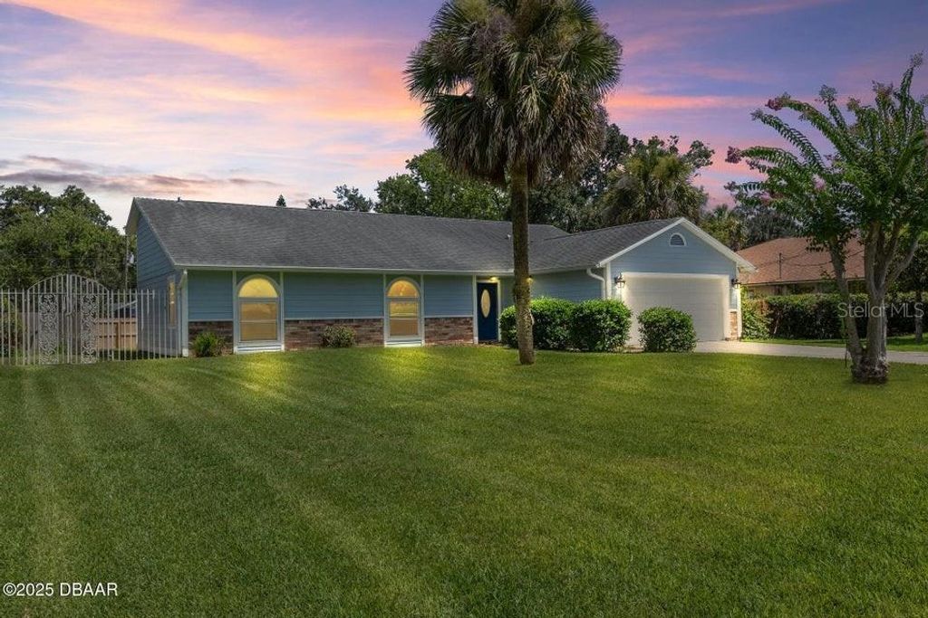 Photo of 475 Hammock Lane, Ormond Beach, FL 32174 (MLS # V4943987)